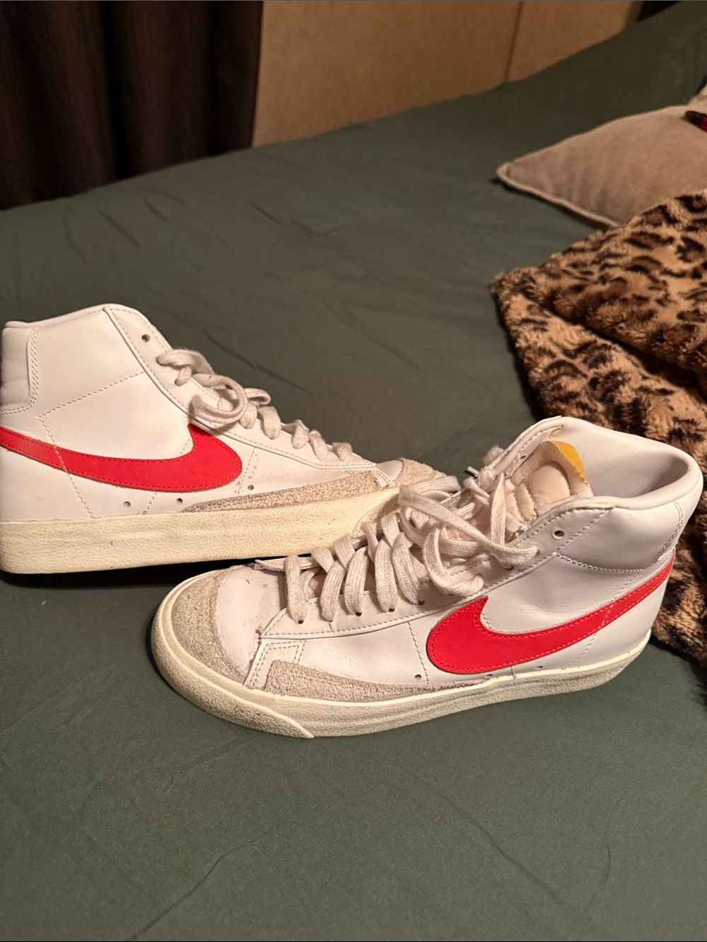 Nike White High-Top Sneakers with Red Swoosh